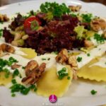 Rotondi mit Marone-Birne-Füllung und Taleggio-Sauce